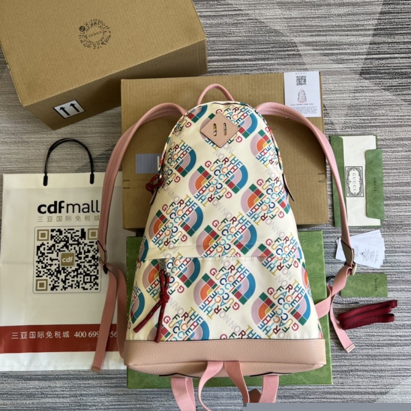 G*u*i backpacks